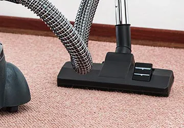 Vacuum on a clean carpet.
