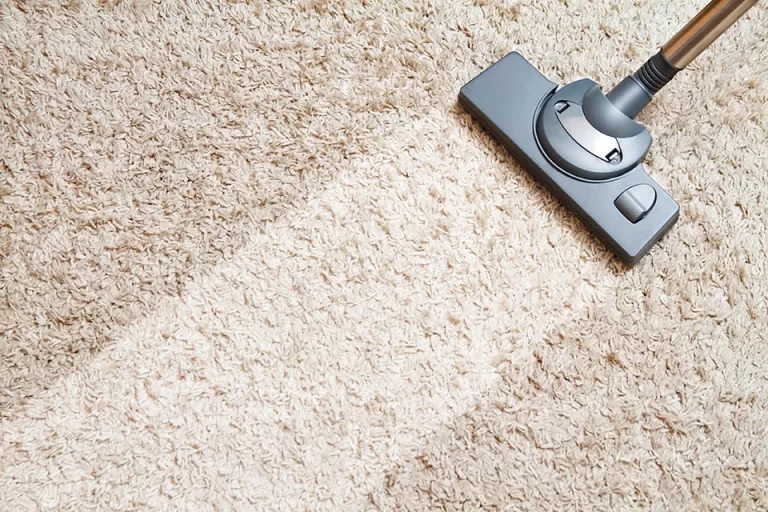 vacuum carpet cleaning creating a clean area on a rug