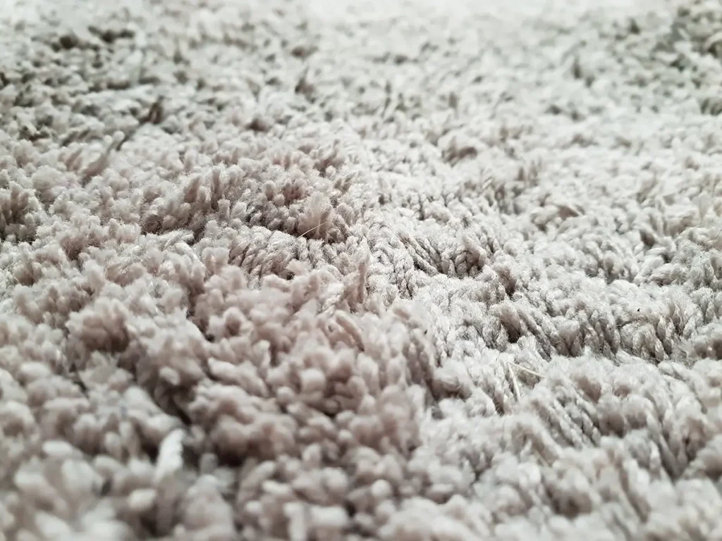 Close up of beige carpet